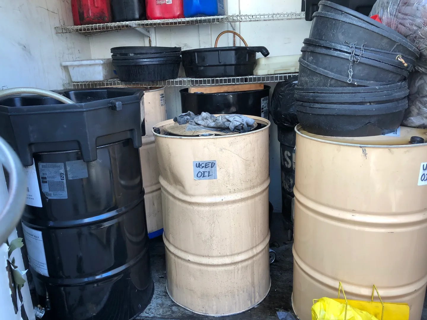 Barrels and containers of used oil.